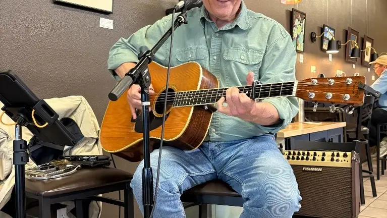 Local musicians frequently play at the shop on weekend mornings.  Art shows, car shows and a summer sellers market also draw people in!