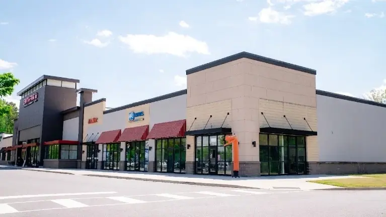 Prime Fort Mill Location: High-traffic Hwy 160 corridor adjacent to Earth Fare. Modern 2024 exterior with prominent signage and easy patient access.