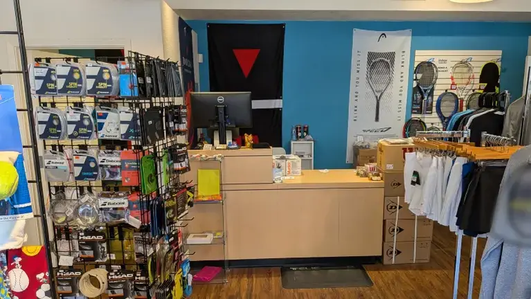 A wide selection of string options displayed near the front counter.