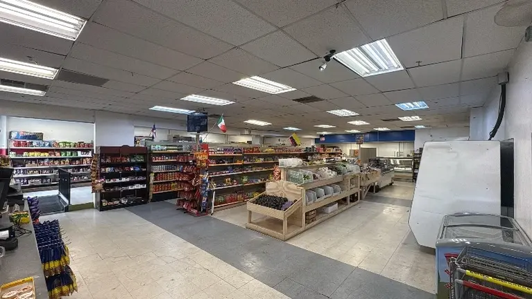 Additional interior view showing full product display and store layout.