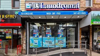 Queen’s Laundromat For Sale Incredible Location!!