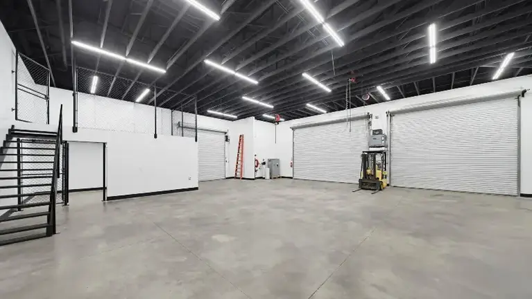 9,267 SF recently improved building featuring storefront, office, expansive shop/warehouse space