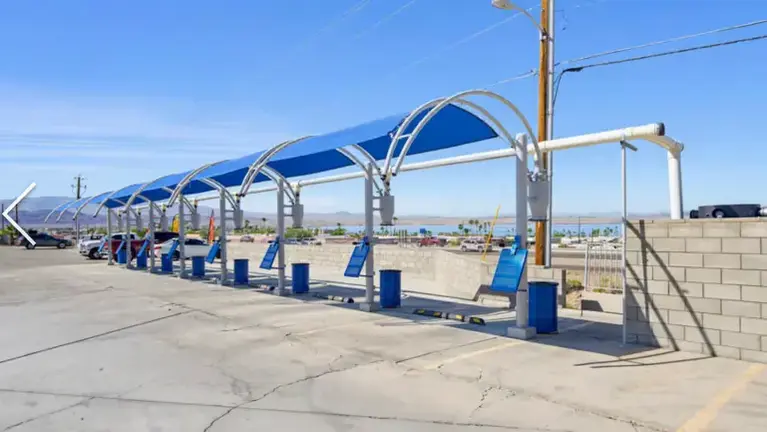 14 self-serve vacuum stations plus a covered vacuum area with 18 nozzles and air 800 AMP 3-phase power