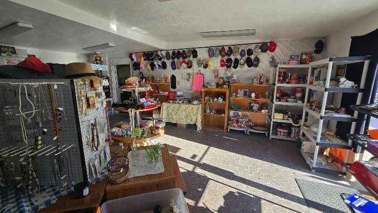 Additional retail space with organized displays and multiple product categories.