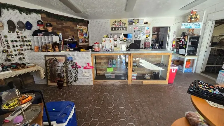 Checkout counter and front area with established customer flow and sales setup