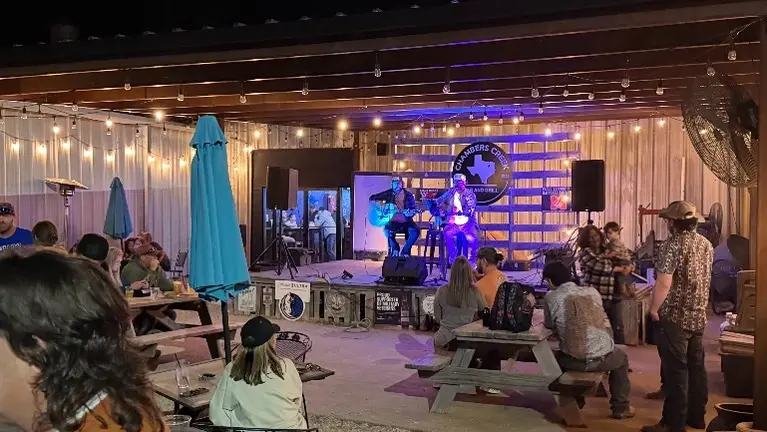 Backyard stage for hosting live music events. Backs up to neighborhood park. Backyard stage for hosting live music events. Backs up to neighborhood park.