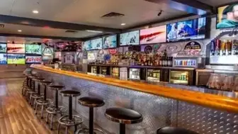 Absentee-Run Kitchen & Sports Bar – 9,700 SF | $317K+ Cash Flow | Perf