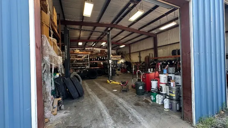 2 Bay Garage with lift. 2 Bay Garage with lift.