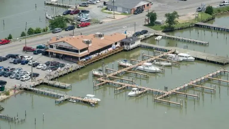 Aerial view of Capt. John's Crab House & marina slips