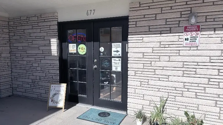 Exterior/storefront with OPEN sign