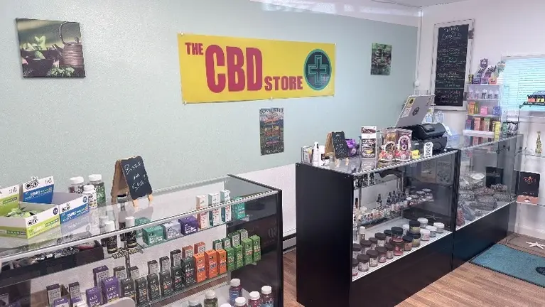Main display floor with branded banner, full product view