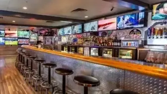 Absentee-Run Kitchen & Sports Bar – 9,700 SF | $317K+ Cash Flow | Perf
