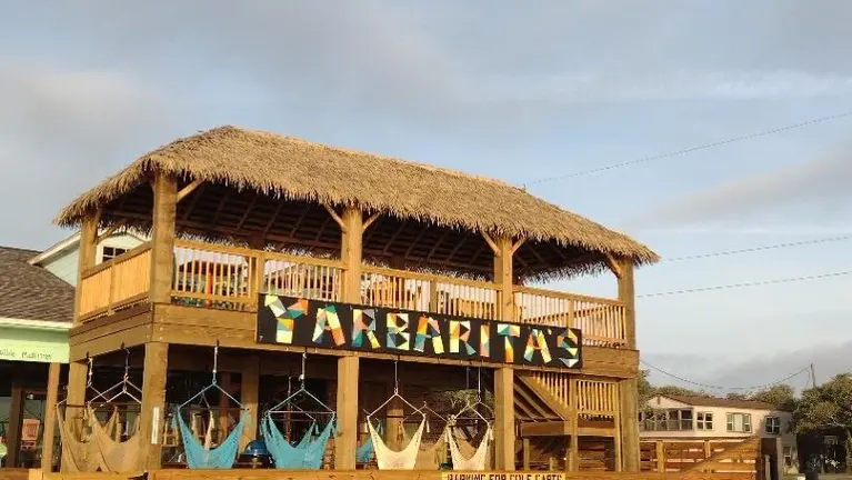 Our 2-Story Palapa Deck is a local landmark!