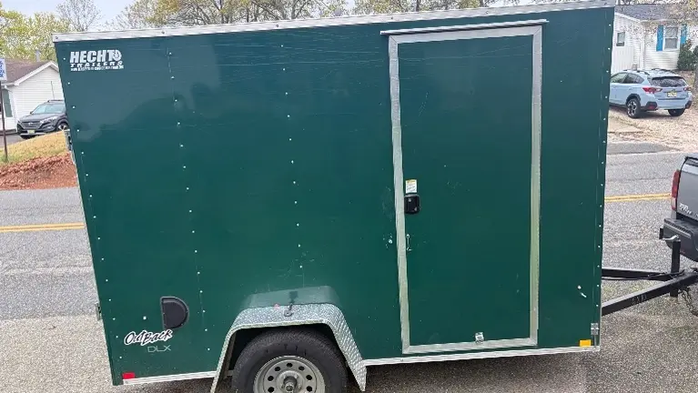 6x10 enclosed trailer with 6.5 ft height and Large pesticide storage box