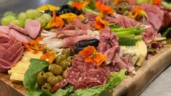 High-Volume Long-Established Family-Owned Deli & Caterer w/Property!