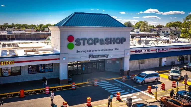 Aerial of Knock Knock with delivery entrance on outside, walkin entry on inside Stop and Shop