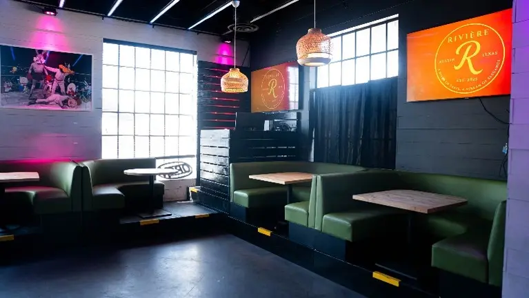 Inside seating area and DJ booth Inside seating area and DJ booth