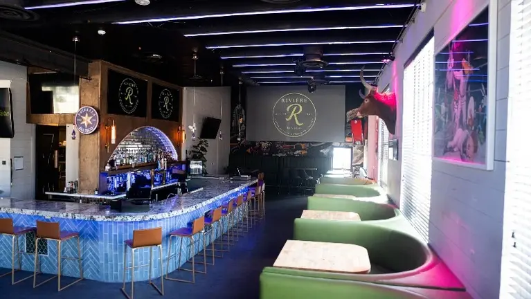 Inside showing part of the bar with seating Inside showing part of the bar with seating