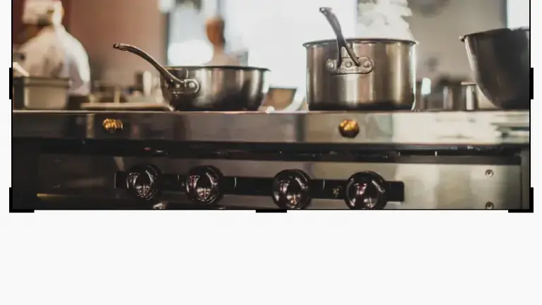 Turnkey commercial kitchen setup with fully vented hood system, cooking line, and grease trap. Turnkey commercial kitchen setup with fully vented hood system, cooking line, and grease trap.