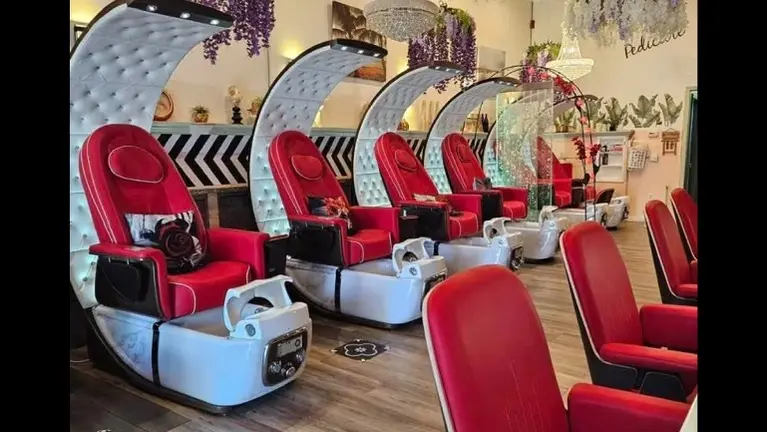 Beautiful pedicure area with multiple luxury spa chairs Beautiful pedicure area with multiple luxury spa chairs