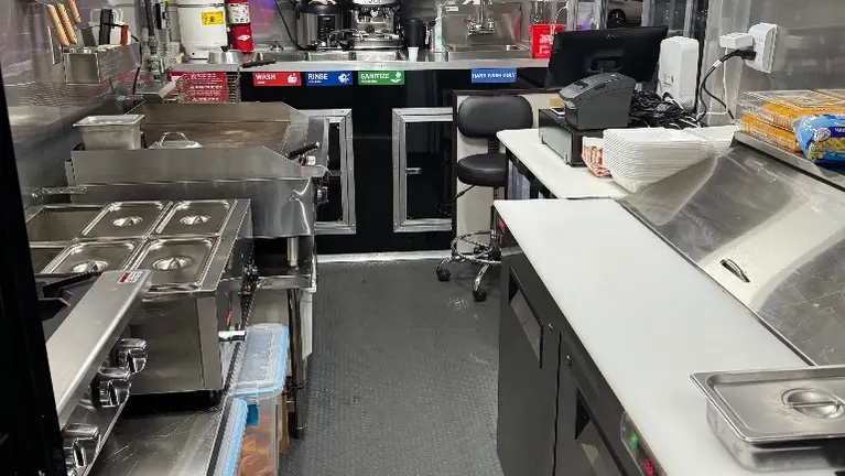 Left : Range,36” griddle,fryer,back 3 compartment sink eapresso machine coffee brewer employee sink ,right 12 comparment prep table &refrigeration storage Left : Range,36” griddle,fryer,back 3 compartment sink eapresso machine coffee brewer employee sink ,right 12 comparment prep table &refrigeration storage