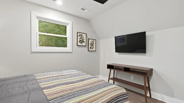 The third floor offers two comfortable bedrooms and a full bathroom, giving guests a quiet, private space to retreat to. The third floor offers two comfortable bedrooms and a full bathroom, giving guests a quiet, private space to retreat to.