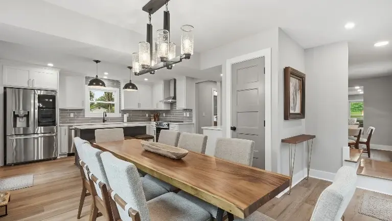 The first floor is built for gathering, with open living, dining, and kitchen spaces that flow easily from room to room. The first floor is built for gathering, with open living, dining, and kitchen spaces that flow easily from room to room.