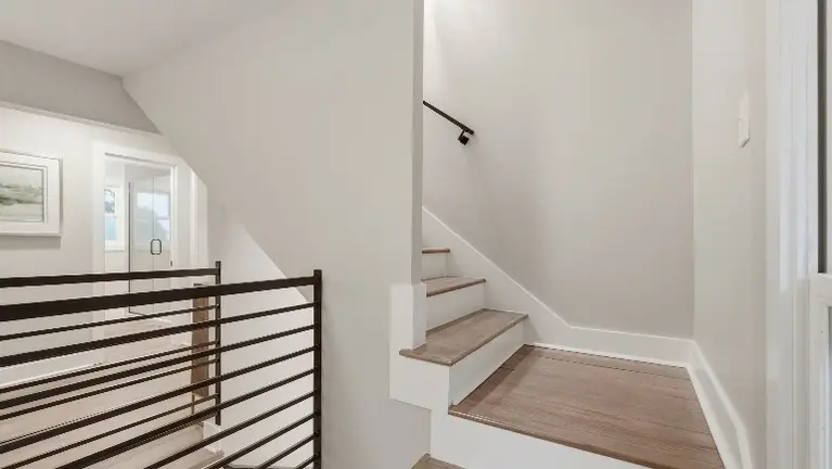 Stairs up to third floor. Stairs up to third floor.