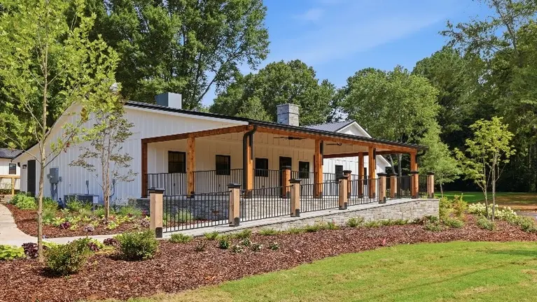 The event and restaurant space's expansive front porch offers a striking outdoor setting, perfect for dinners, weddings, and gatherings of all kinds. The event and restaurant space's expansive front porch offers a striking outdoor setting, perfect for dinners, weddings, and gatherings of all kinds.