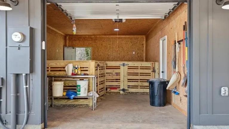 The custom barn offers a versatile space for farm experiences and gatherings, complete with a maintenance shop and stables built right in. The custom barn offers a versatile space for farm experiences and gatherings, complete with a maintenance shop and stables built right in.