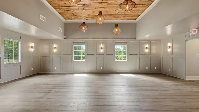 Warm lighting and refined details inside create an inviting atmosphere for guests the moment they walk in. Warm lighting and refined details inside create an inviting atmosphere for guests the moment they walk in.