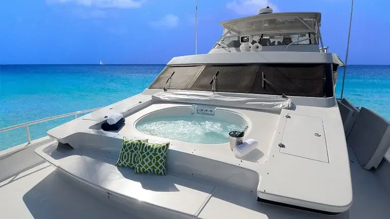 Relax in the bow jacuzzi (or use as an xlg bunny pad while taking in panoramic Caribbean views from one of the yacht's most unforgettable entertaining spaces. Relax in the bow jacuzzi (or use as an xlg bunny pad while taking in panoramic Caribbean views from one of the yacht's most unforgettable entertaining spaces.