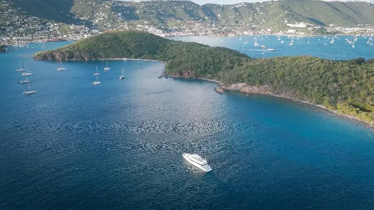 Your private luxury yacht anchored in the crystal-clear waters of the U.S. Virgin Islands, just minutes from Charlotte Amalie, St. Thomas. (3 hours from FL Your private luxury yacht anchored in the crystal-clear waters of the U.S. Virgin Islands, just minutes from Charlotte Amalie, St. Thomas. (3 hours from FL