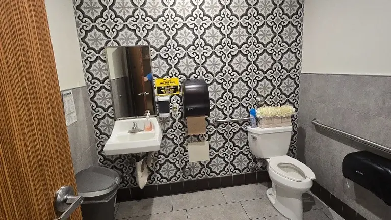 2 big restrooms with clean decors 2 big restrooms with clean decors
