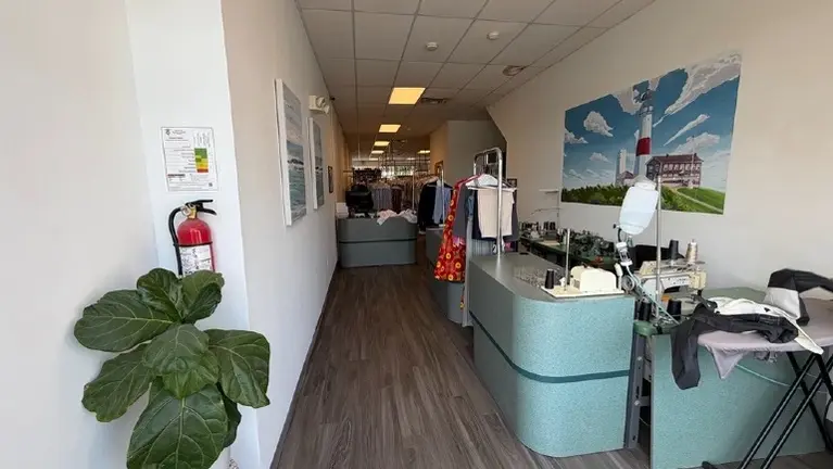 Interior view — front counter and processing area Interior view — front counter and processing area
