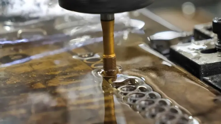 Industrial threading with machine oil