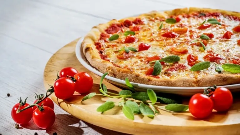 Fresh Take 'N' Bake pizza — scratch-made dough, hand-sliced veggies, freshly grated mozzarella daily. Fresh Take 'N' Bake pizza — scratch-made dough, hand-sliced veggies, freshly grated mozzarella daily.