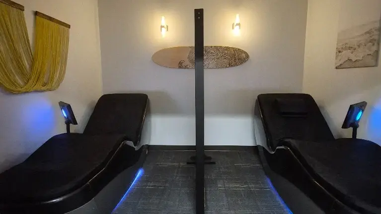 Dedicated recovery area with two hydro massage beds, included in the sale.