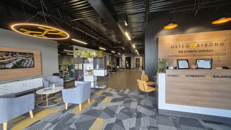 Professionally designed reception and member lounge area with upgraded finishes.