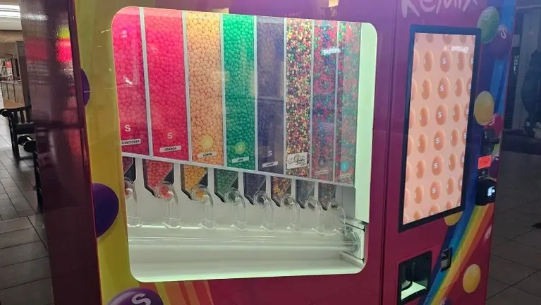 Eight-selection Skittles dispensing system and illuminated display Eight-selection Skittles dispensing system and illuminated display