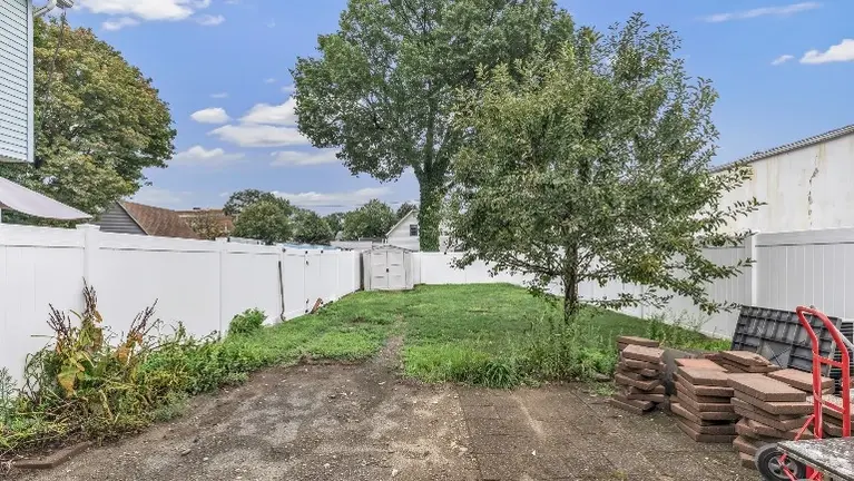 Private fenced in courtyard at rear of building. Private fenced in courtyard at rear of building.