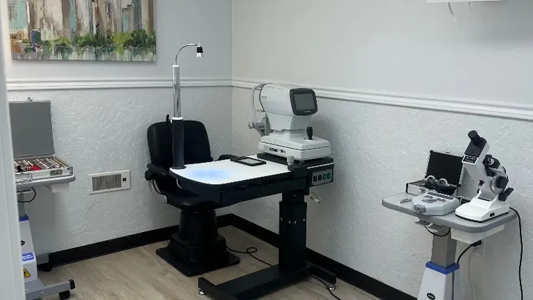 Fully equipped optical examination and diagnostic area with professional ophthalmic equipment, ready for continued operation.