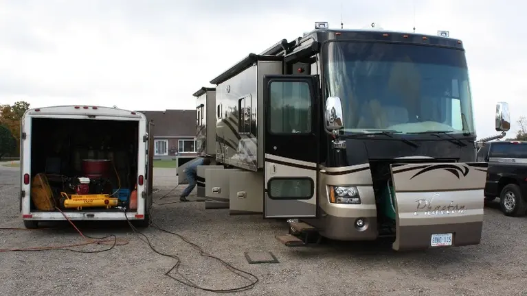 Spraying RV Dealership