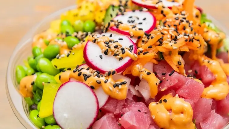 Fresh, Customizable Poké Bowls — Fresh proteins, vegetables, toppings and signature sauces create a colorful, customizable menu with broad appeal. Fresh, Customizable Poké Bowls — Fresh proteins, vegetables, toppings and signature sauces create a colorful, customizable menu with broad appeal.