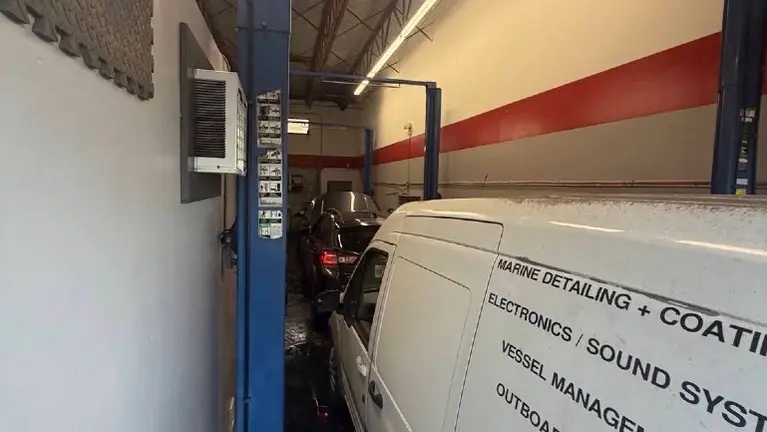 Fully Equipped Service Bay with Professional Equipment Fully Equipped Service Bay with Professional Equipment